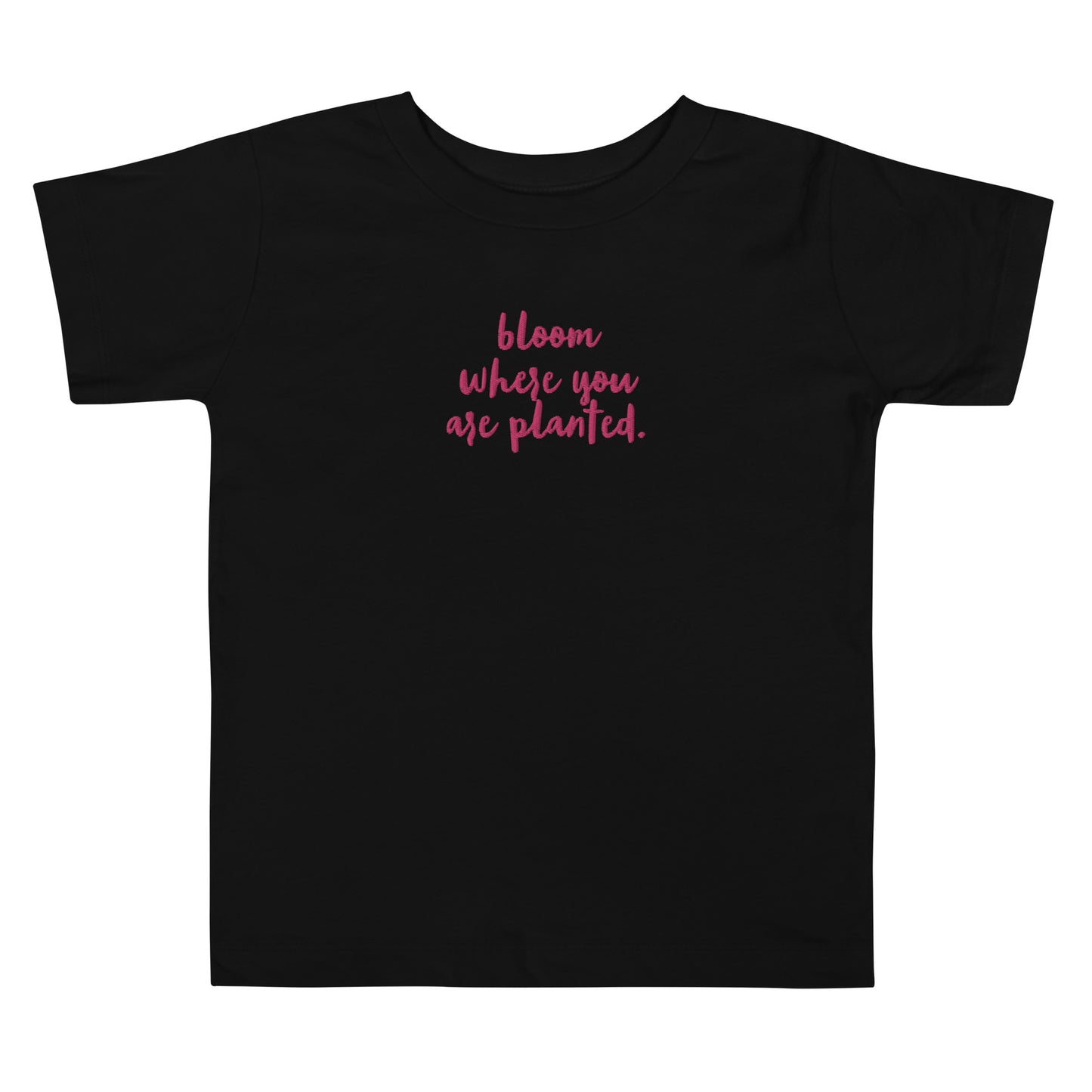 “bloom where you are planted.” Embroidered front + Flowers Printed back Toddler Short Sleeve Tee