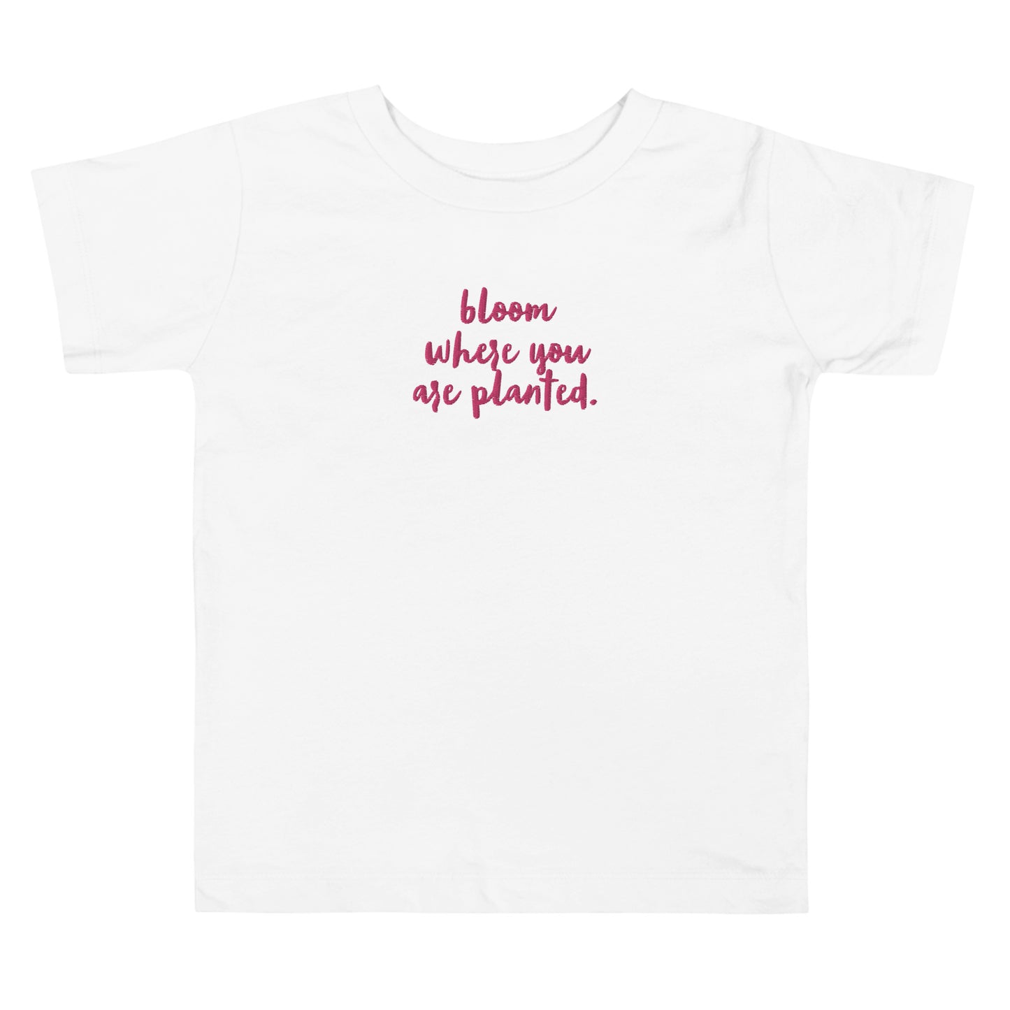 “bloom where you are planted.” Embroidered front + Flowers Printed back Toddler Short Sleeve Tee